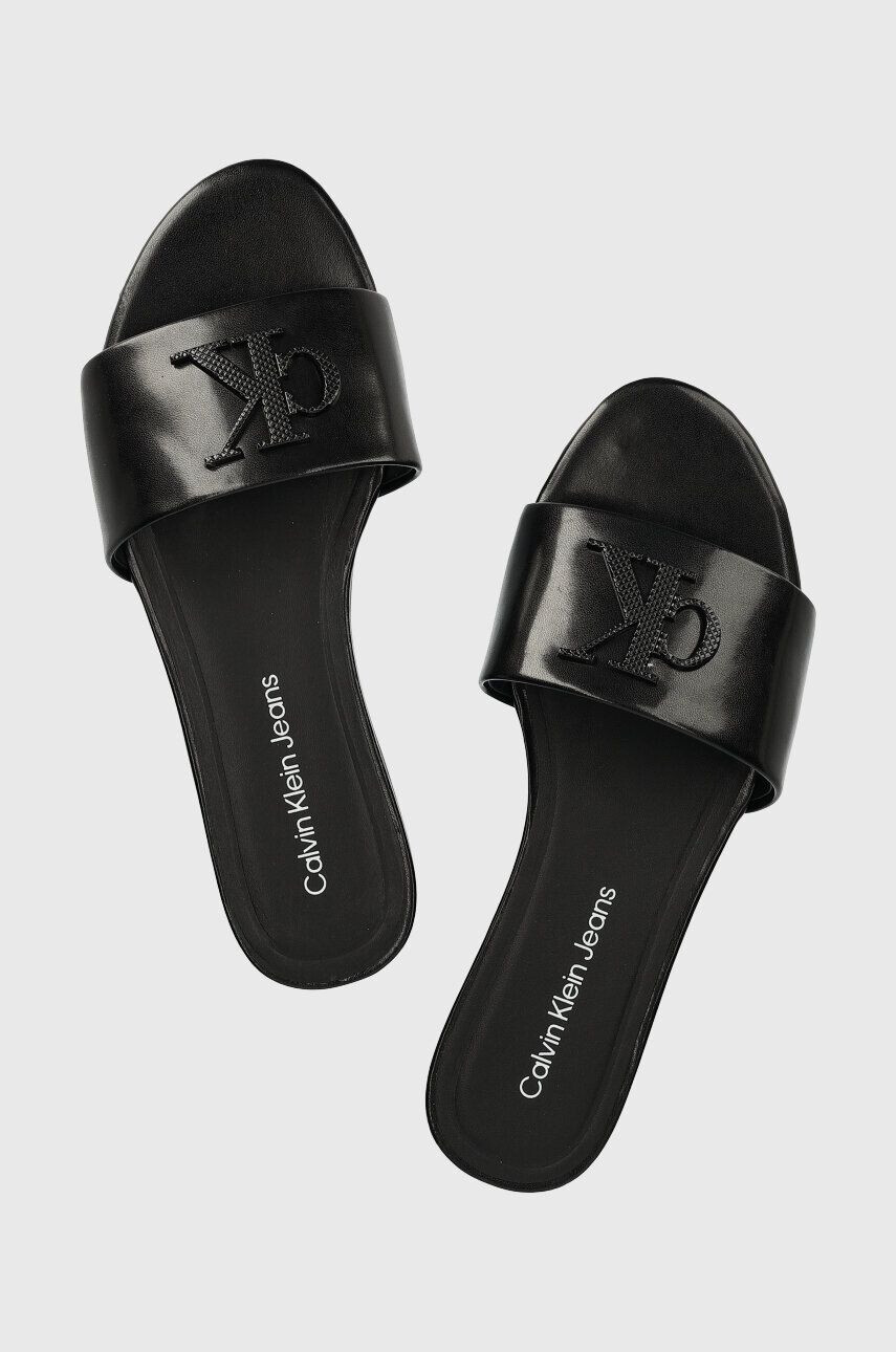 Calvin Klein Jeans Kožené šľapky FLAT SANDAL STRAP HW dámske čierna farba YW0YW00952 - Pepit.sk