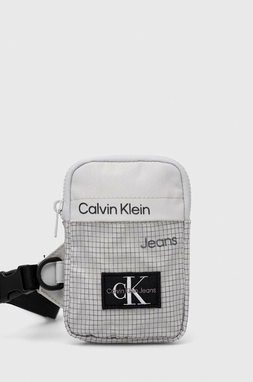 Calvin Klein Jeans Malá taška šedá farba - Pepit.sk