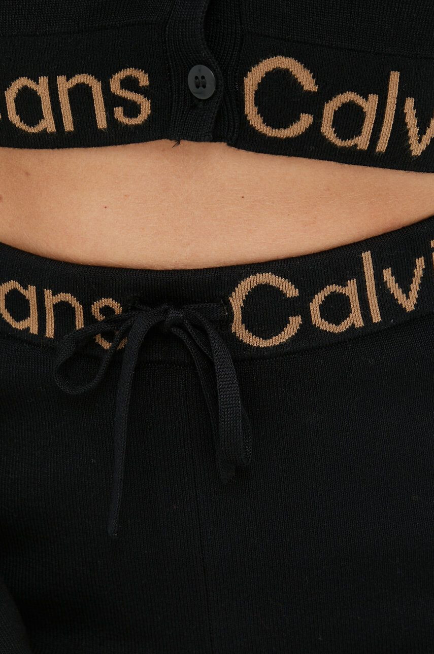 Calvin Klein Jeans Nohavice dámske čierna farba zvony vysoký pás - Pepit.sk