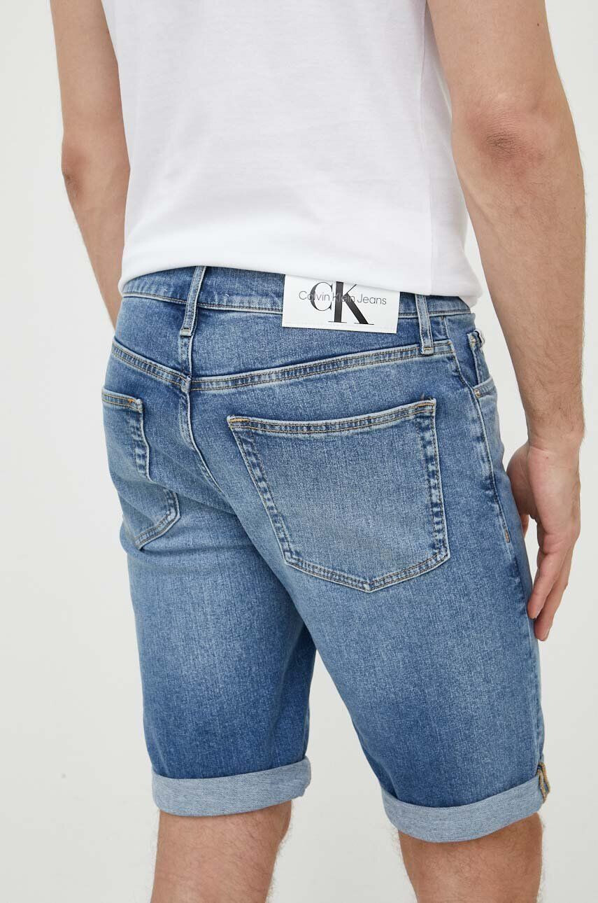 Calvin Klein Jeans Rifľové krátke nohavice dámske tmavomodrá farba jednofarebné vysoký pás - Pepit.sk