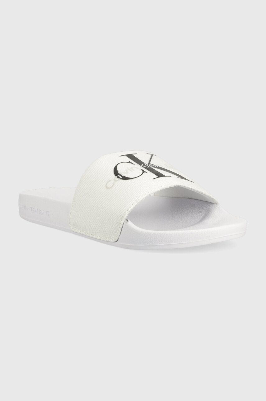 Calvin Klein Jeans Šľapky SLIDE MONOGRAM CO dámske biela farba YW0YW00103 - Pepit.sk