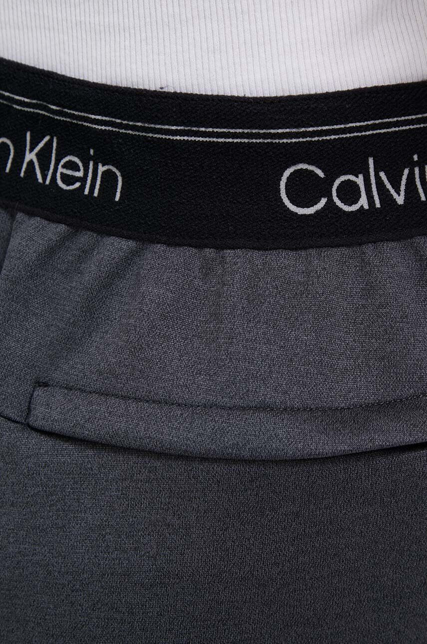 Calvin Klein Performance Tréningové nohavice šedá farba melanžové - Pepit.sk