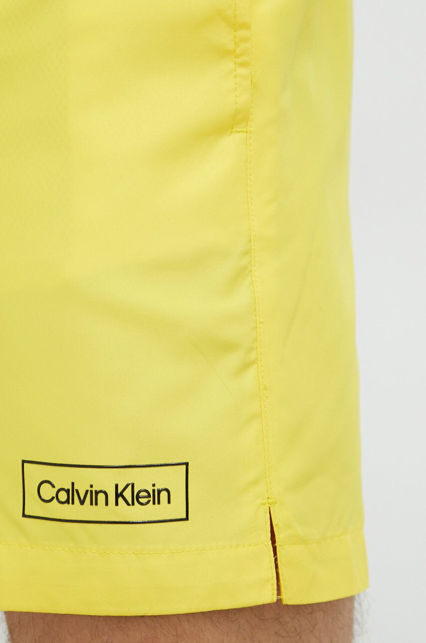 Calvin Klein Plavkové šortky žltá farba - Pepit.sk