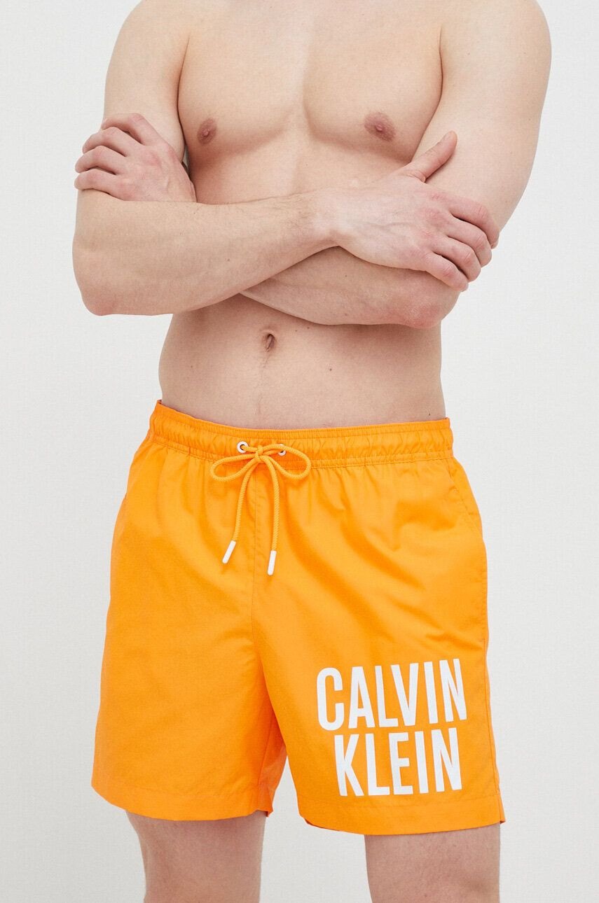 Calvin Klein Plavkové šortky oranžová farba - Pepit.sk