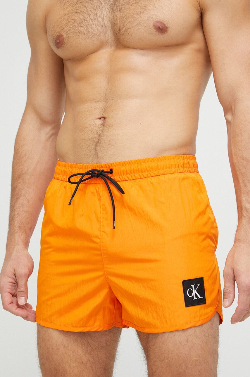 Calvin Klein Plavkové šortky oranžová farba - Pepit.sk