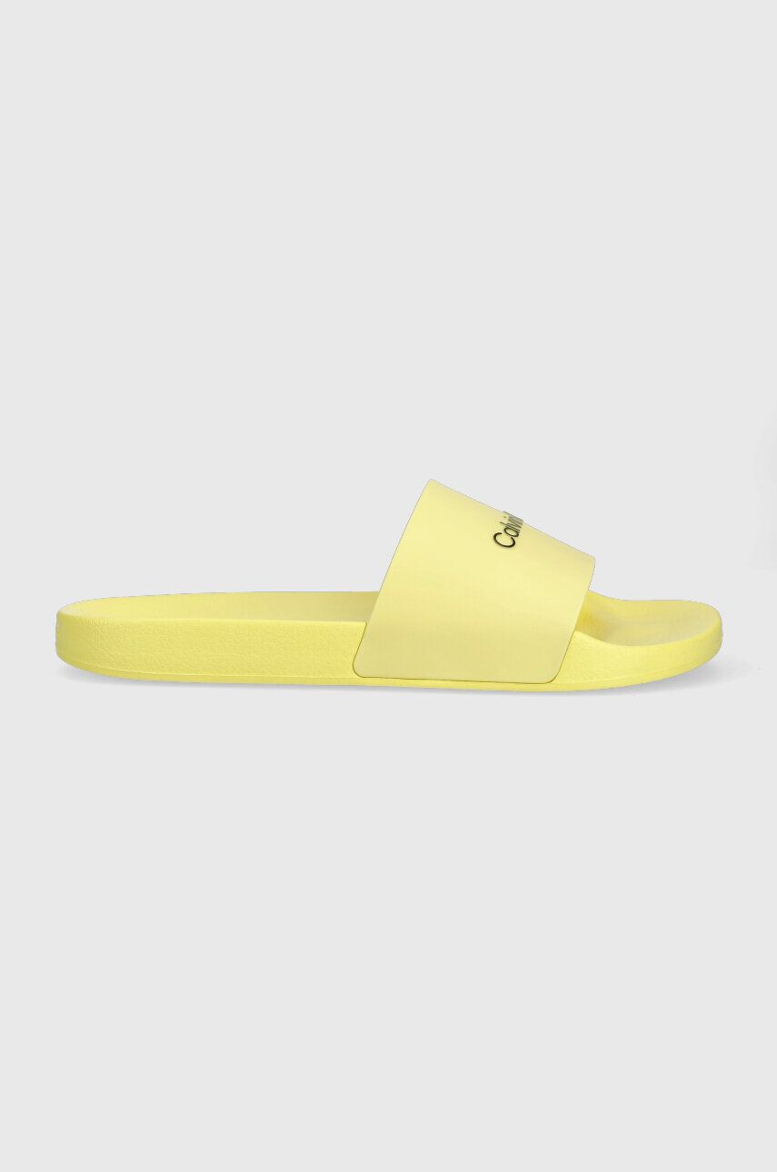 Calvin Klein Šľapky POOL SLIDE RUBBER pánske žltá farba HM0HM00455 - Pepit.sk