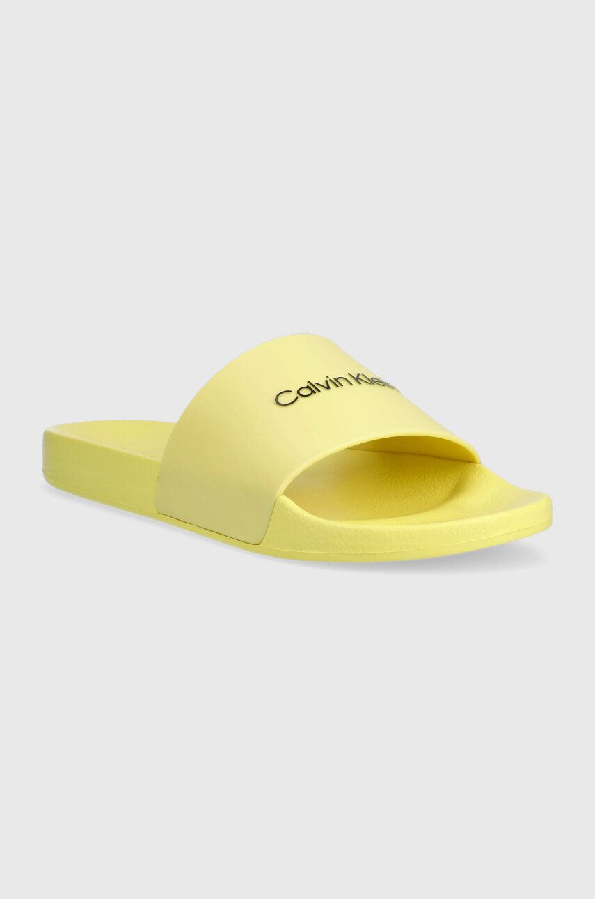 Calvin Klein Šľapky POOL SLIDE RUBBER pánske žltá farba HM0HM00455 - Pepit.sk