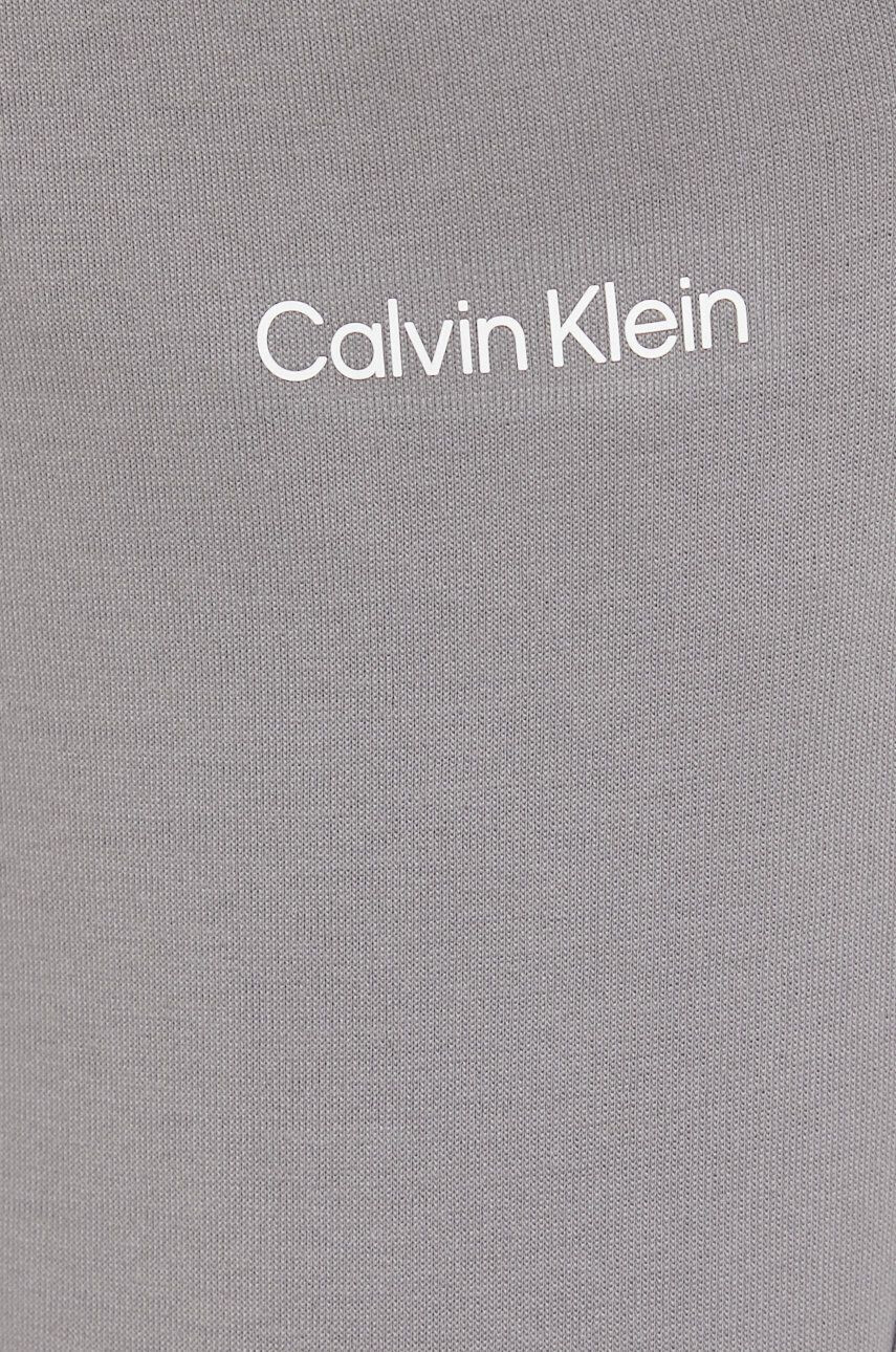 Calvin Klein Tepláky pánske šedá farba jednofarebné - Pepit.sk