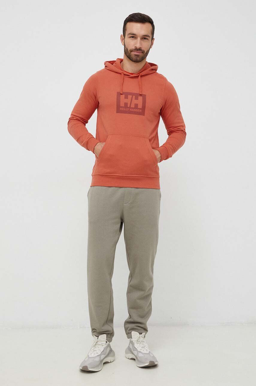 Helly Hansen Bavlnená mikina 53289-597 oranžová farba s kapucňou s potlačou - Pepit.sk