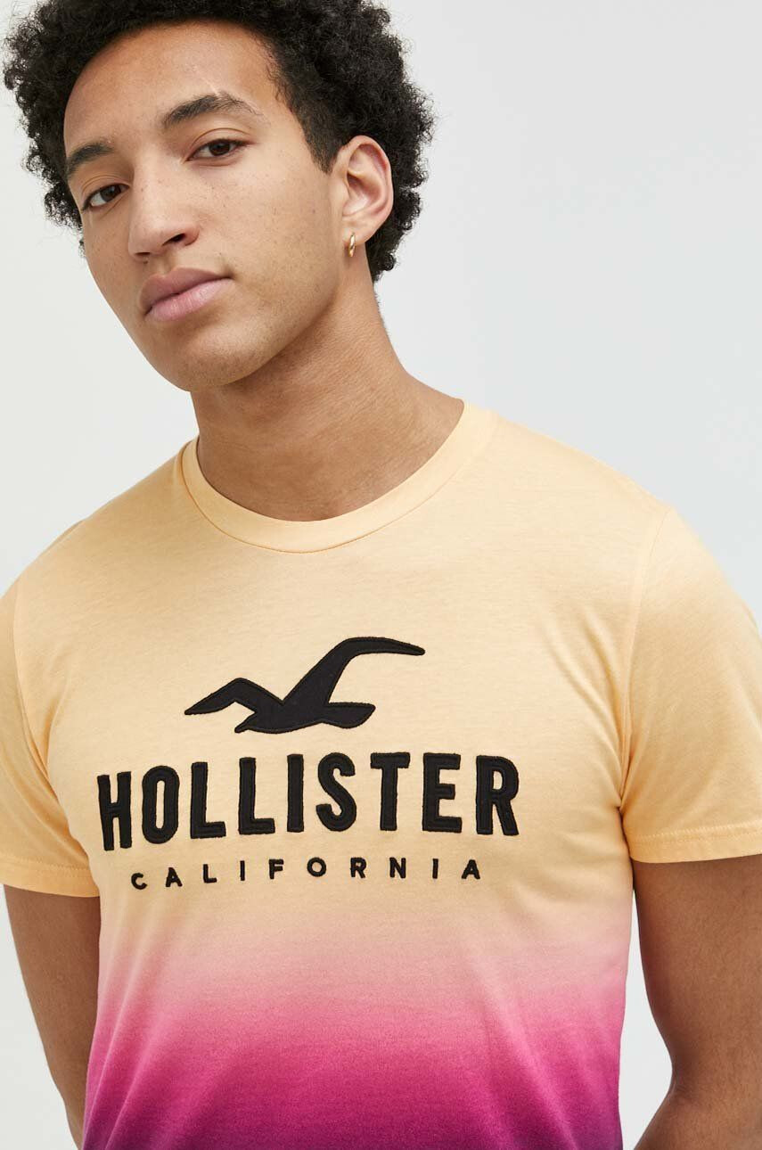 Hollister Co. Bavlnené tričko žltá farba vzorované - Pepit.sk