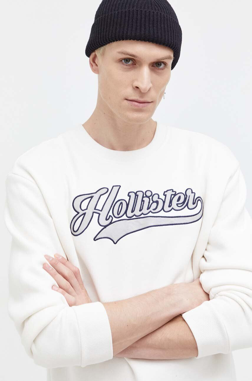 Hollister Co. Mikina pánska béžová farba s nášivkou - Pepit.sk