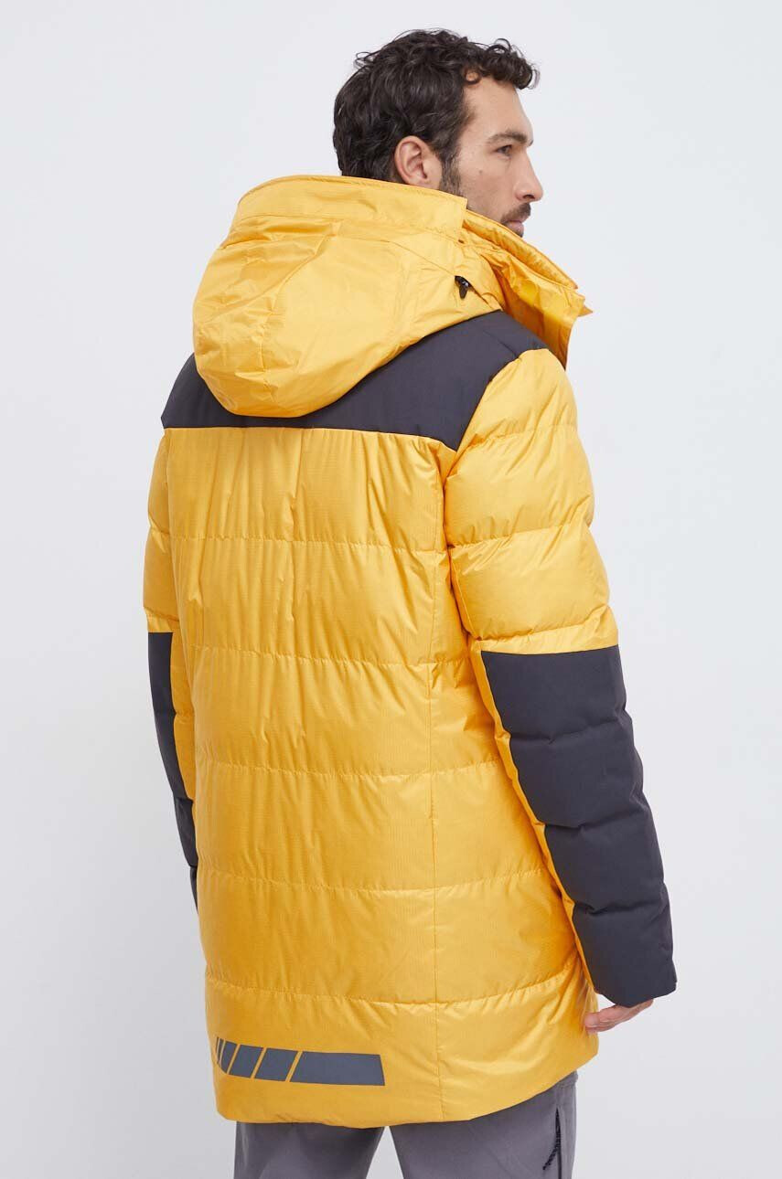 Jack Wolfskin Páperová bunda 1995 Series Cook žltá farba - Pepit.sk