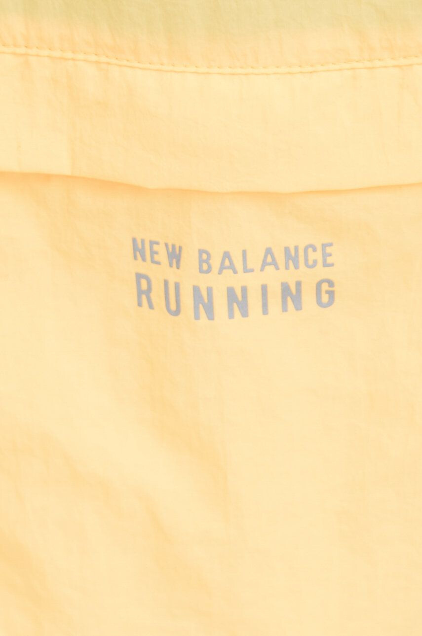 New Balance Bežecká bunda Impact Run oranžová farba prechodná oversize - Pepit.sk