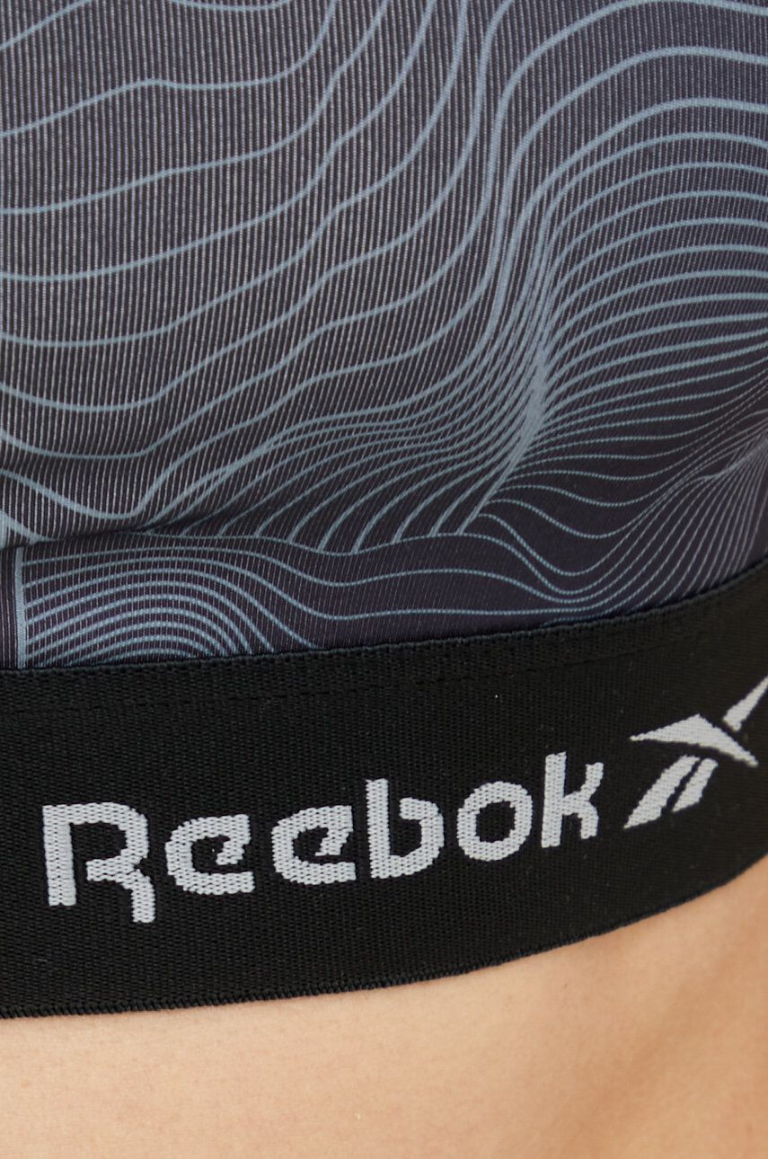 Reebok Športová podprsenka Nelly tmavomodrá farba vzorovaná - Pepit.sk