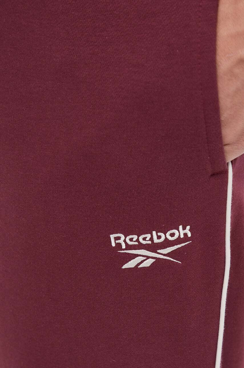 Reebok Tepláky bordová farba jednofarebné - Pepit.sk