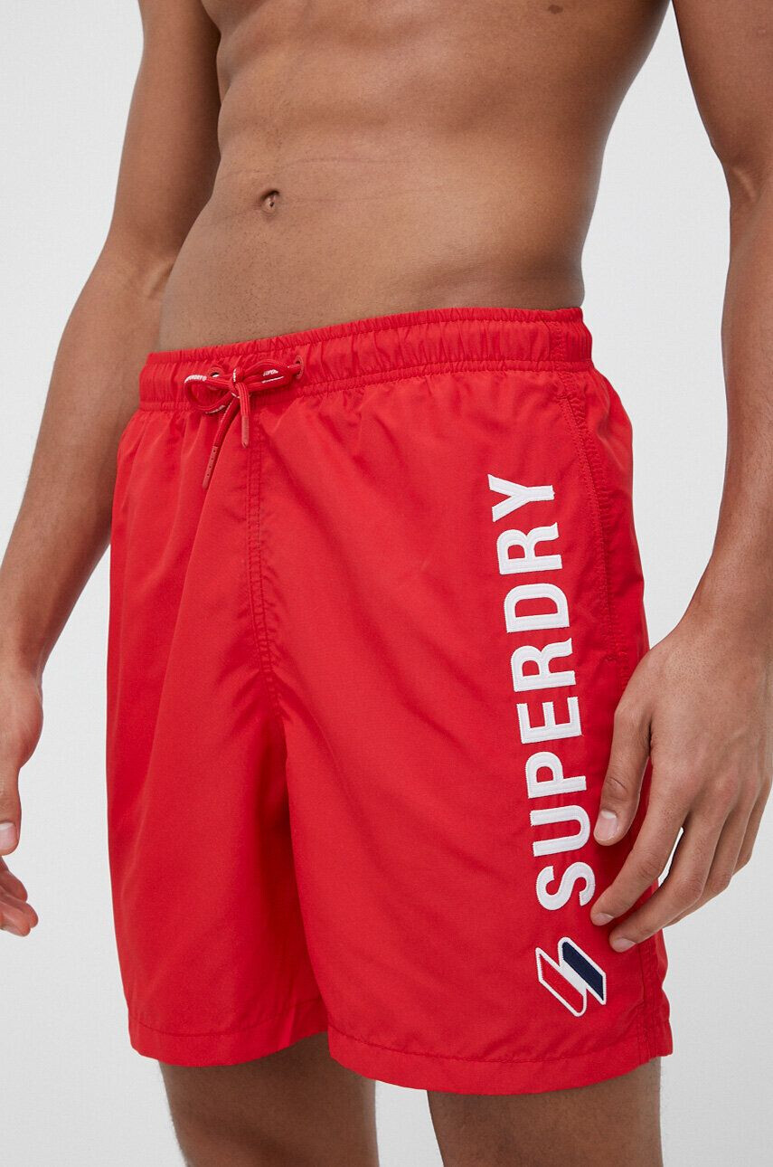 Superdry Plavkové šortky červená farba - Pepit.sk