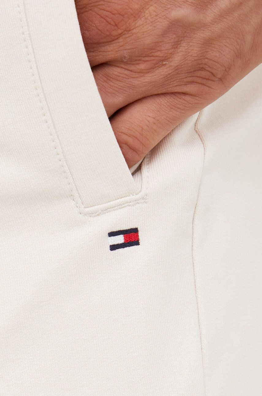 Tommy Hilfiger Tepláky pánske béžová farba jednofarebné - Pepit.sk