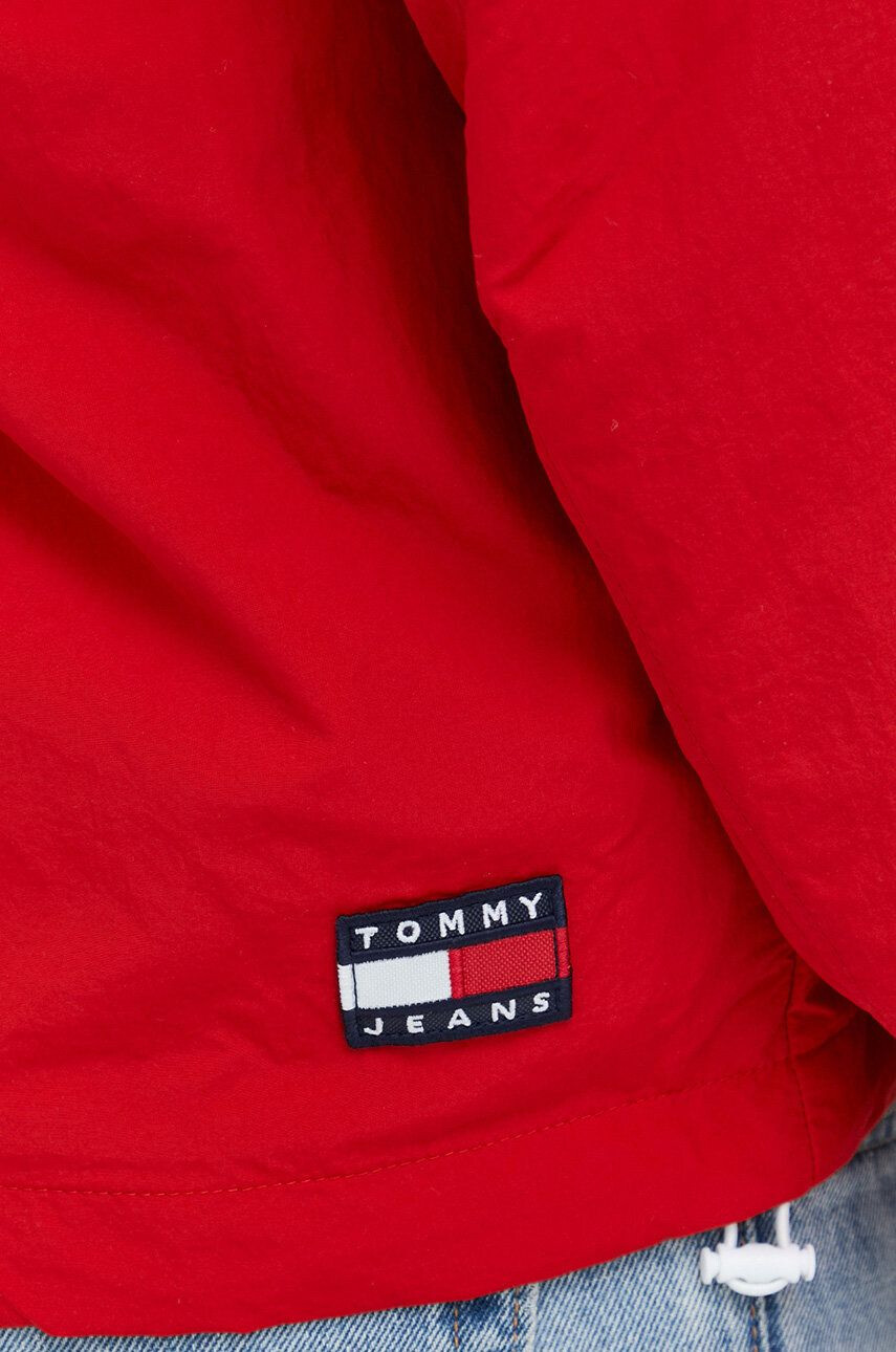 Tommy Jeans Bunda pánska červená farba prechodná - Pepit.sk