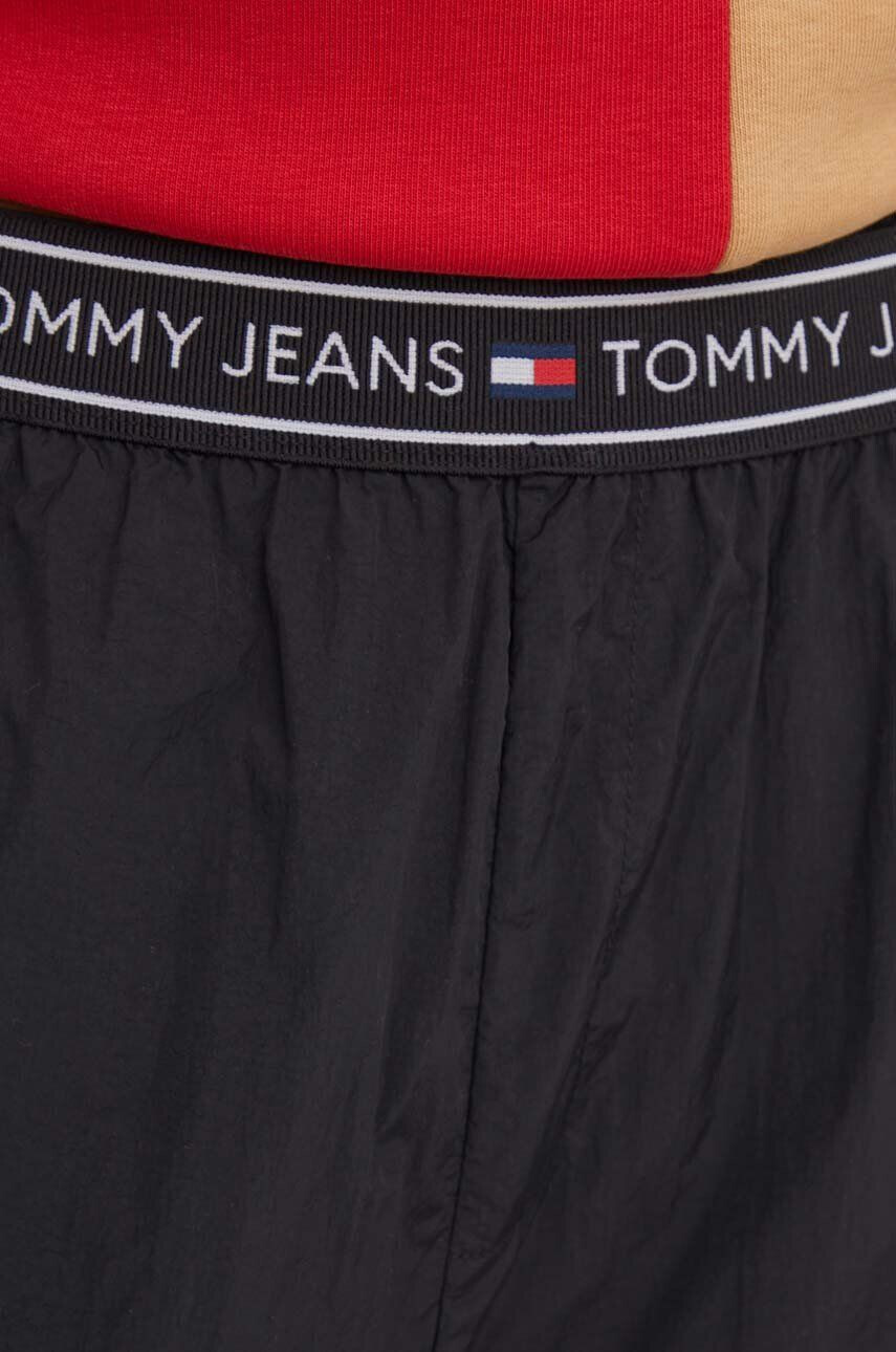 Tommy Jeans Tepláky čierna farba jednofarebné - Pepit.sk