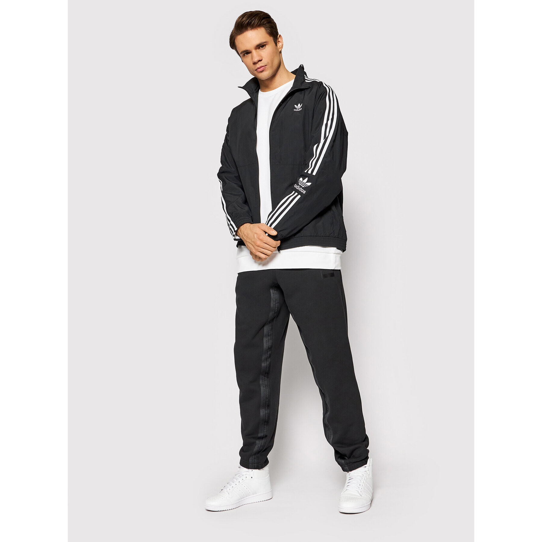 adidas Prechodná bunda adicolor Classics Lock-Up Trefoil Track H41391 Čierna Loose Fit - Pepit.sk