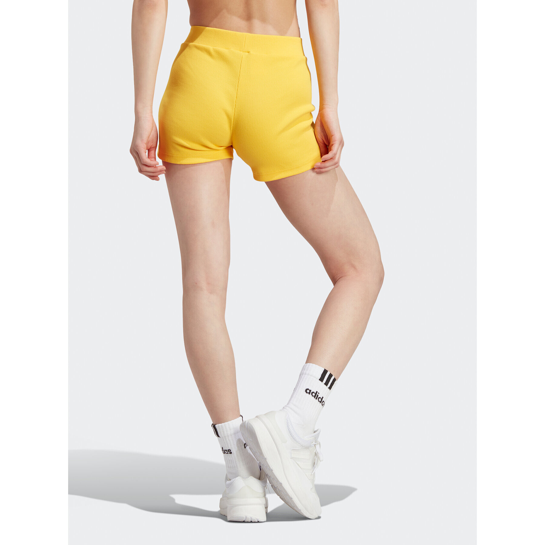 adidas Športové kraťasy Lounge Rib Booty Shorts IC9453 Žltá Fitted Fit - Pepit.sk