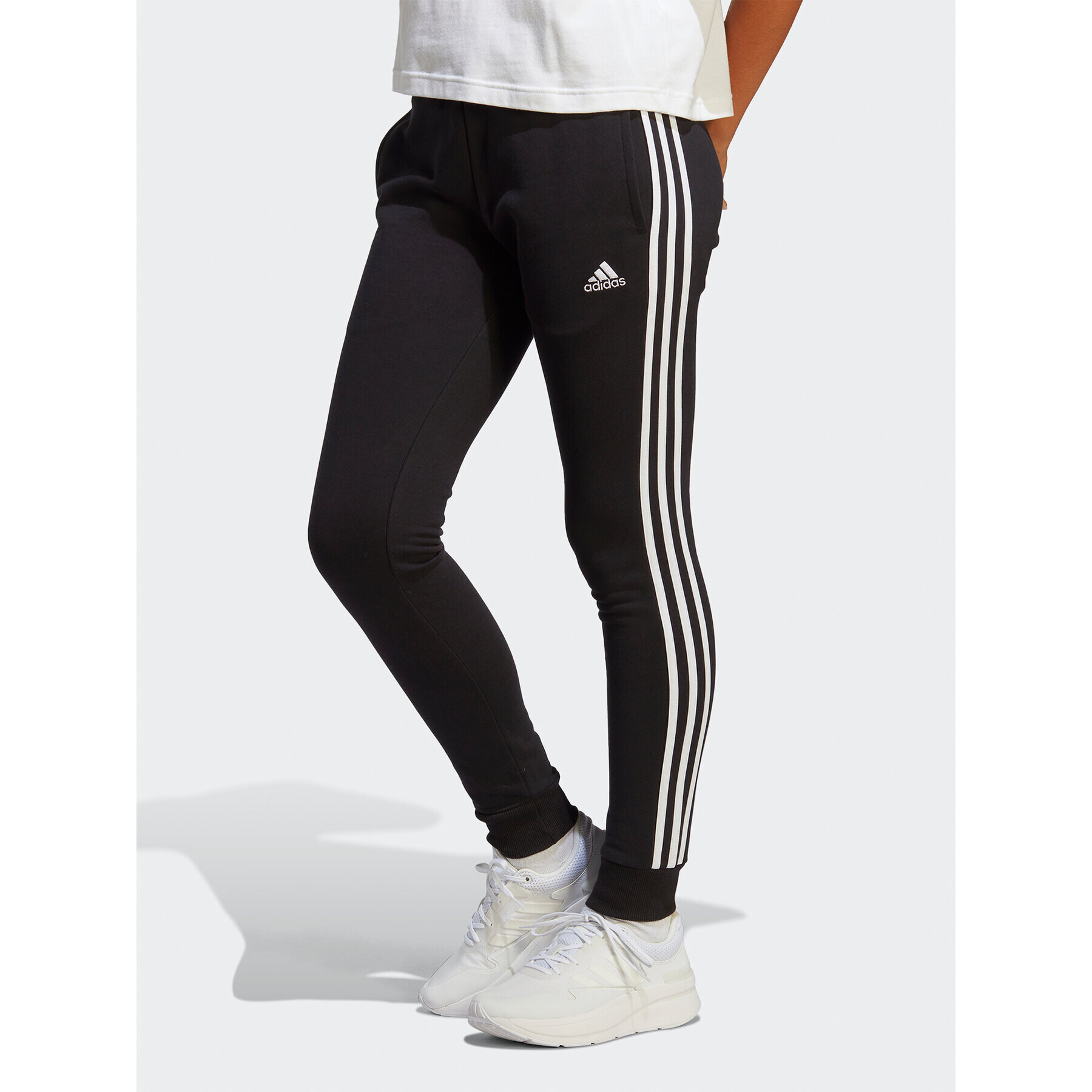 adidas Teplákové nohavice Essentials 3-Stripes French Terry Cuffed Joggers IC8770 Čierna Slim Fit - Pepit.sk