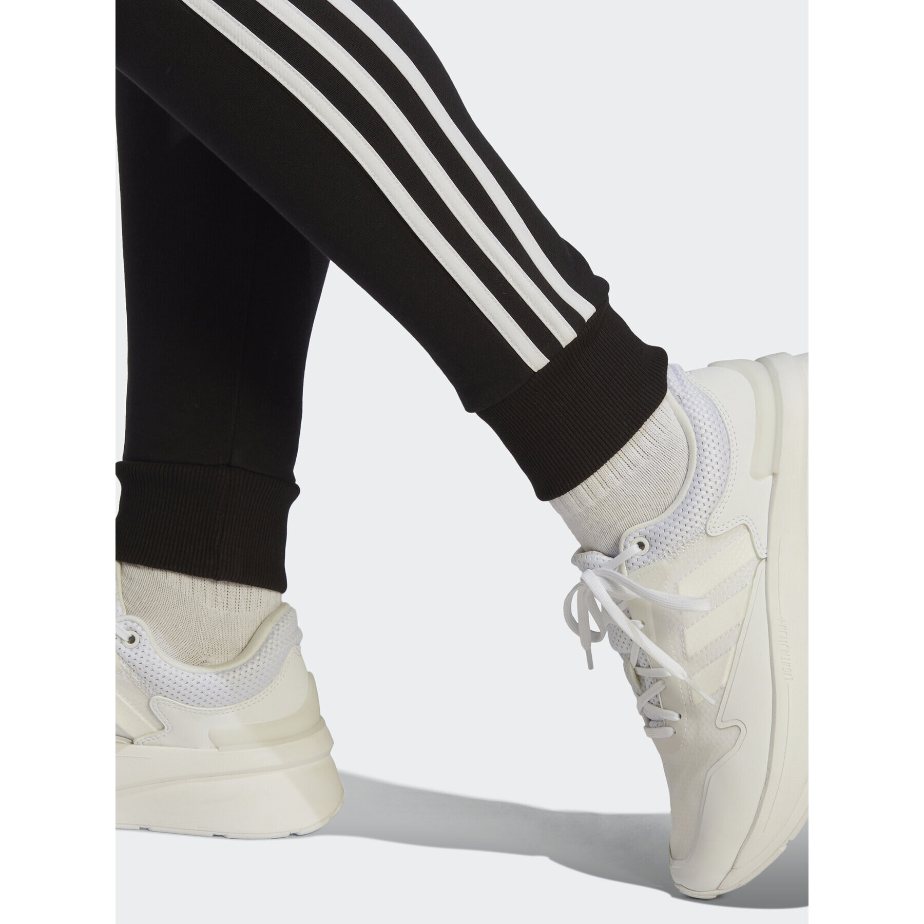 adidas Teplákové nohavice Essentials 3-Stripes French Terry Cuffed Joggers IC8770 Čierna Slim Fit - Pepit.sk