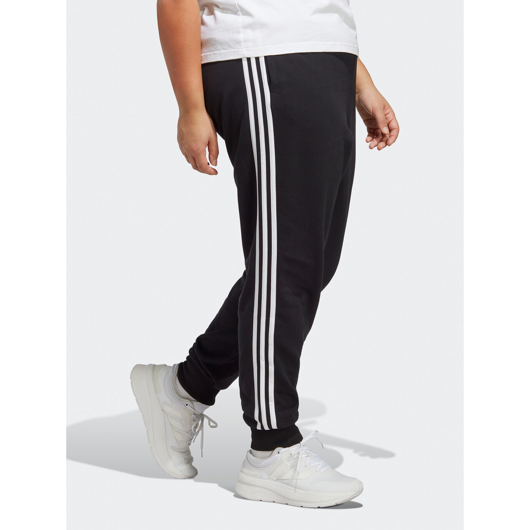 adidas Teplákové nohavice Essentials 3-Stripes French Terry Cuffed Joggers (Plus Size) IB8745 Čierna Slim Fit - Pepit.sk