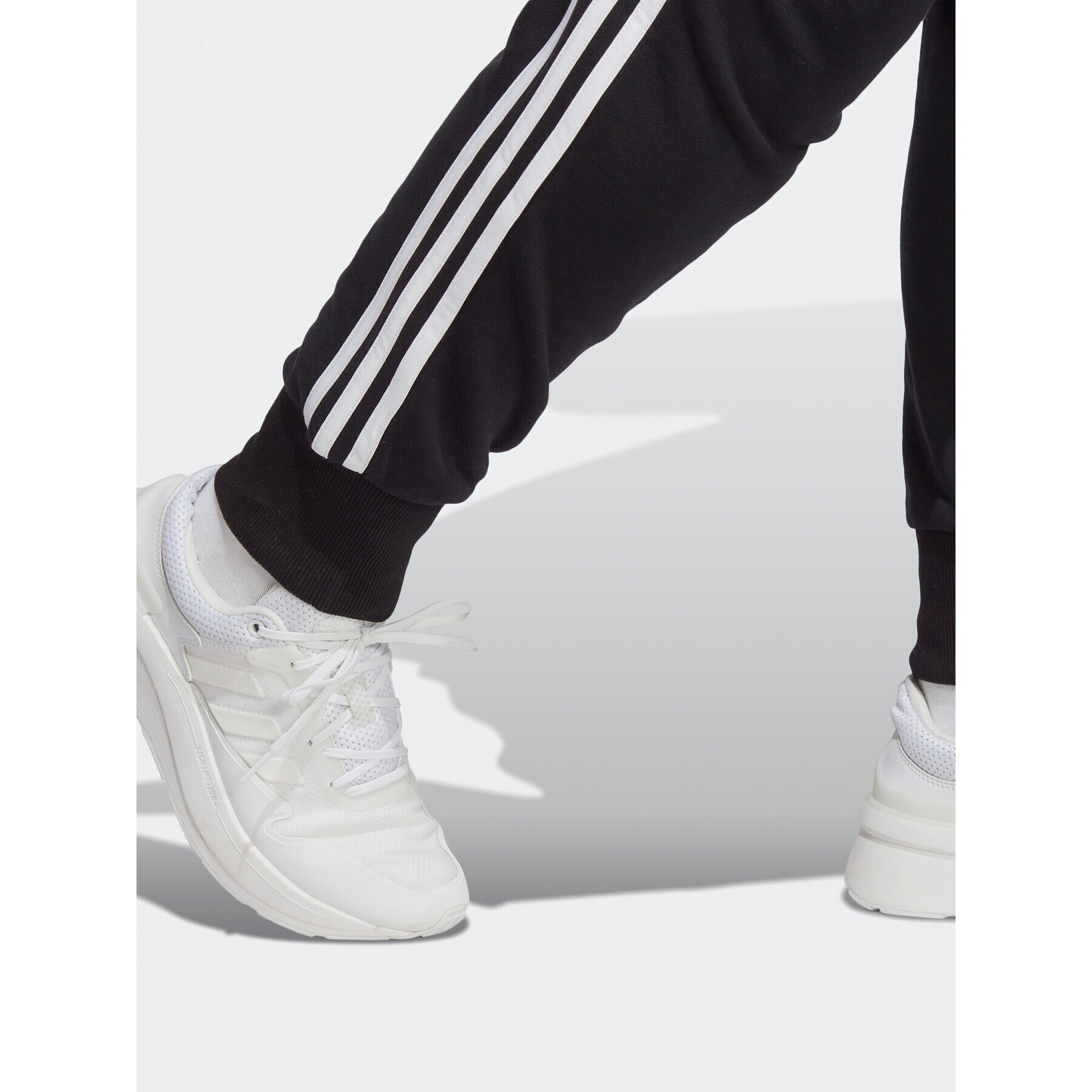 adidas Teplákové nohavice Essentials 3-Stripes French Terry Cuffed Joggers (Plus Size) IB8745 Čierna Slim Fit - Pepit.sk