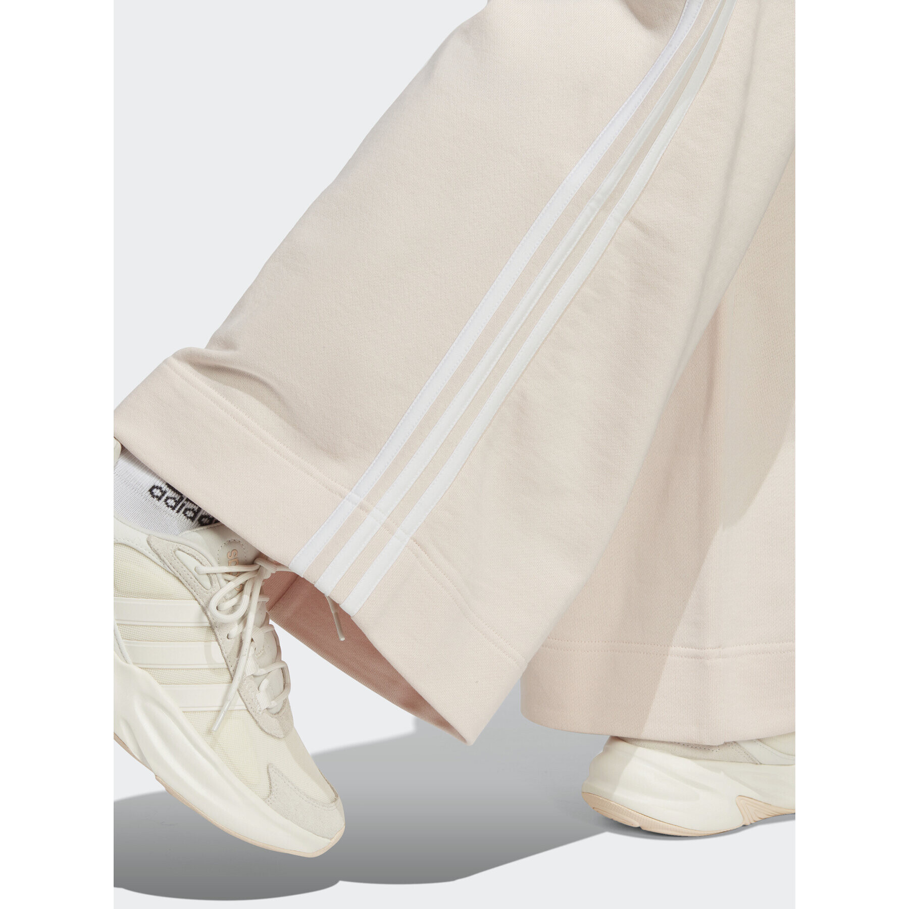 adidas Teplákové nohavice Essentials 3-Stripes French Terry Wide Joggers IC9929 Ružová Regular Fit - Pepit.sk