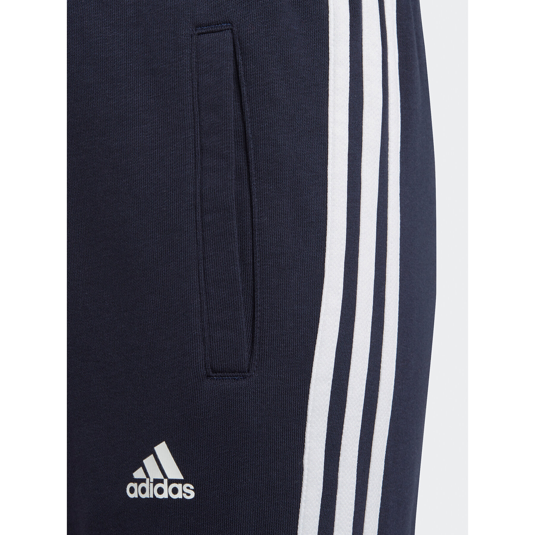 adidas Teplákové nohavice Essentials 3-Stripes IC6128 Tmavomodrá Slim Fit - Pepit.sk