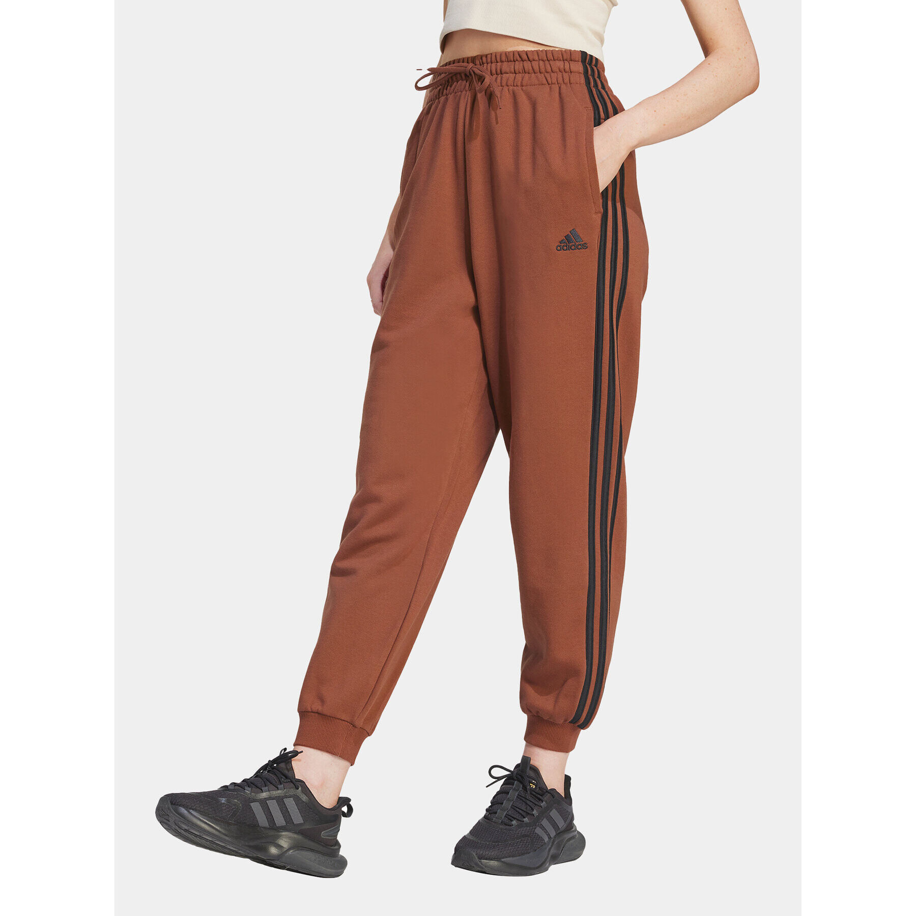 adidas Teplákové nohavice Essentials 3-Stripes IL3451 Hnedá Loose Fit - Pepit.sk