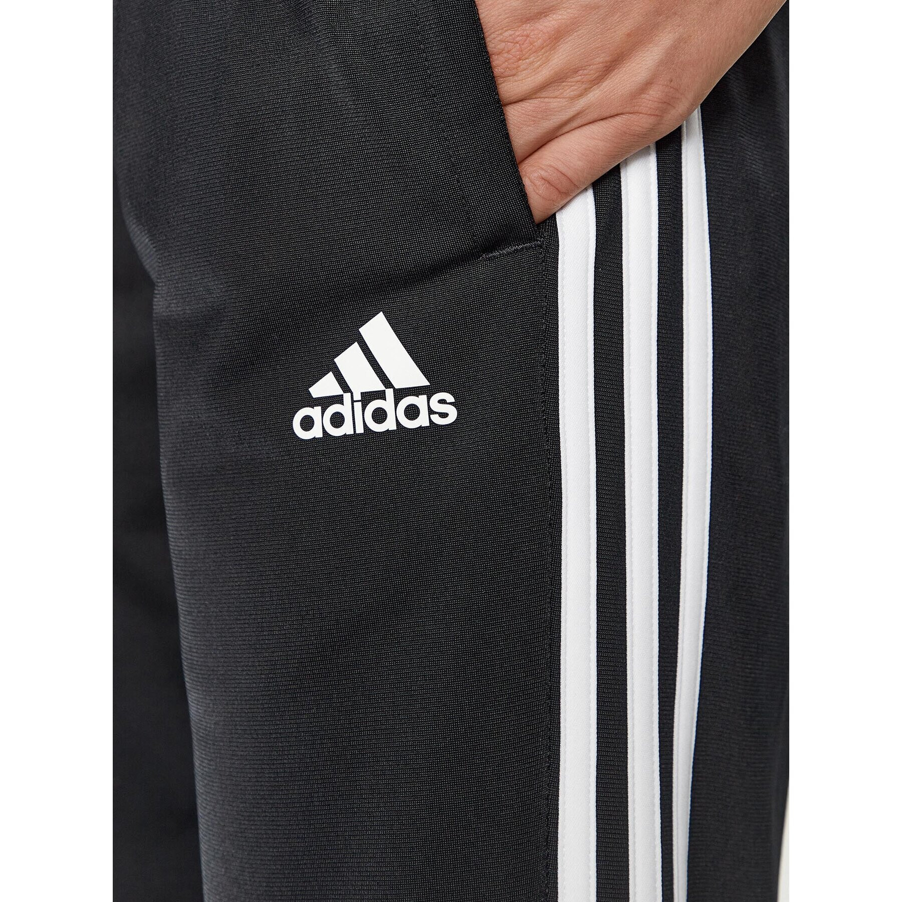 adidas Teplákové nohavice Essentials Warm-Up 3-Stripes H48451 Čierna Regular Fit - Pepit.sk