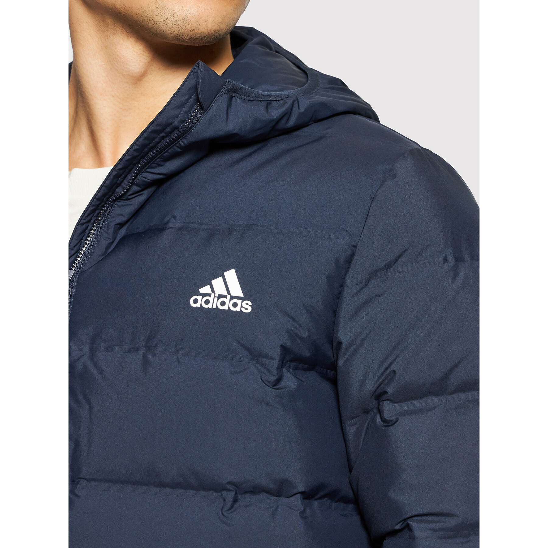 adidas Vatovaná bunda Helionic GE5811 Tmavomodrá Slim Fit - Pepit.sk