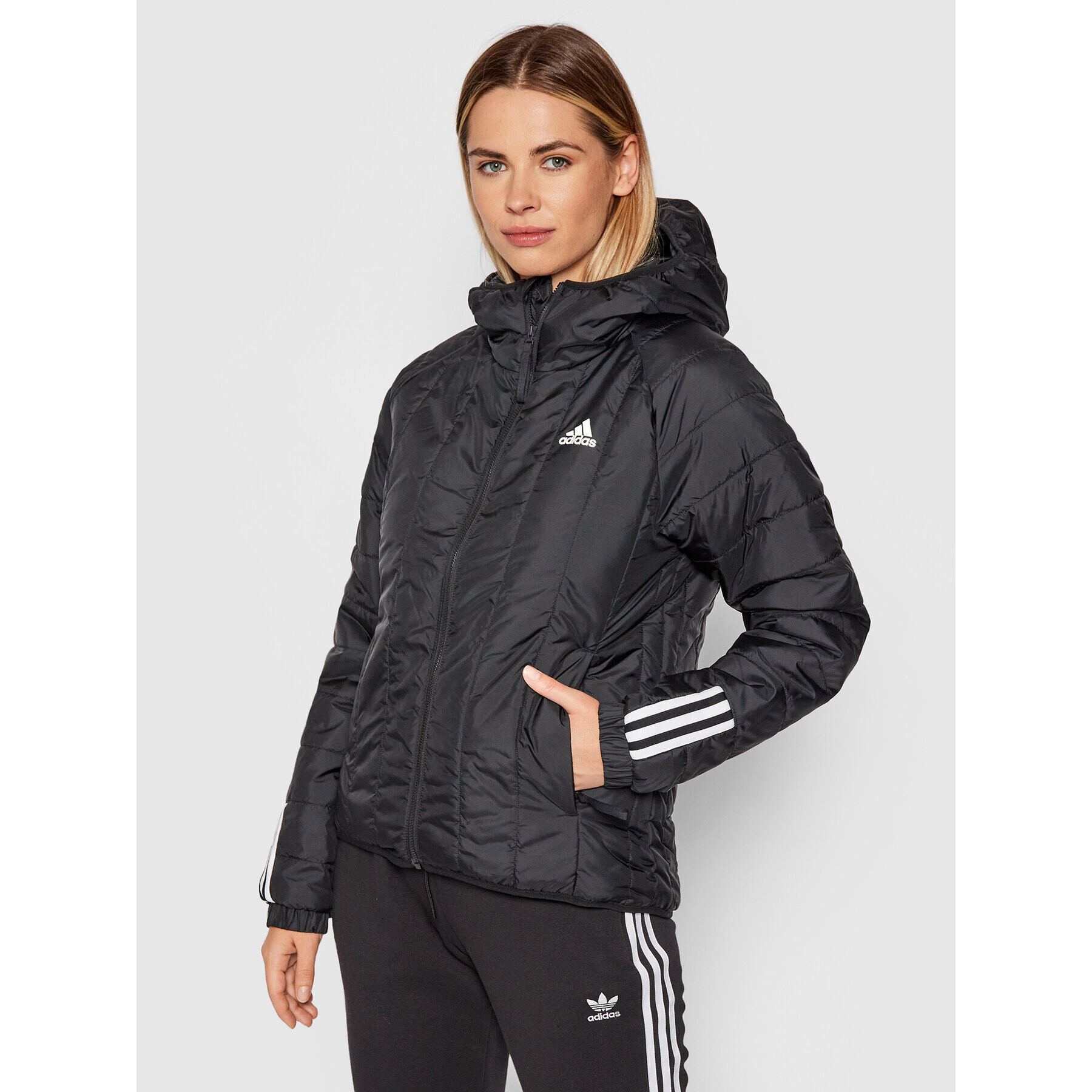 adidas Vatovaná bunda Itavic 3-Stripes GU3957 Čierna Regular Fit - Pepit.sk