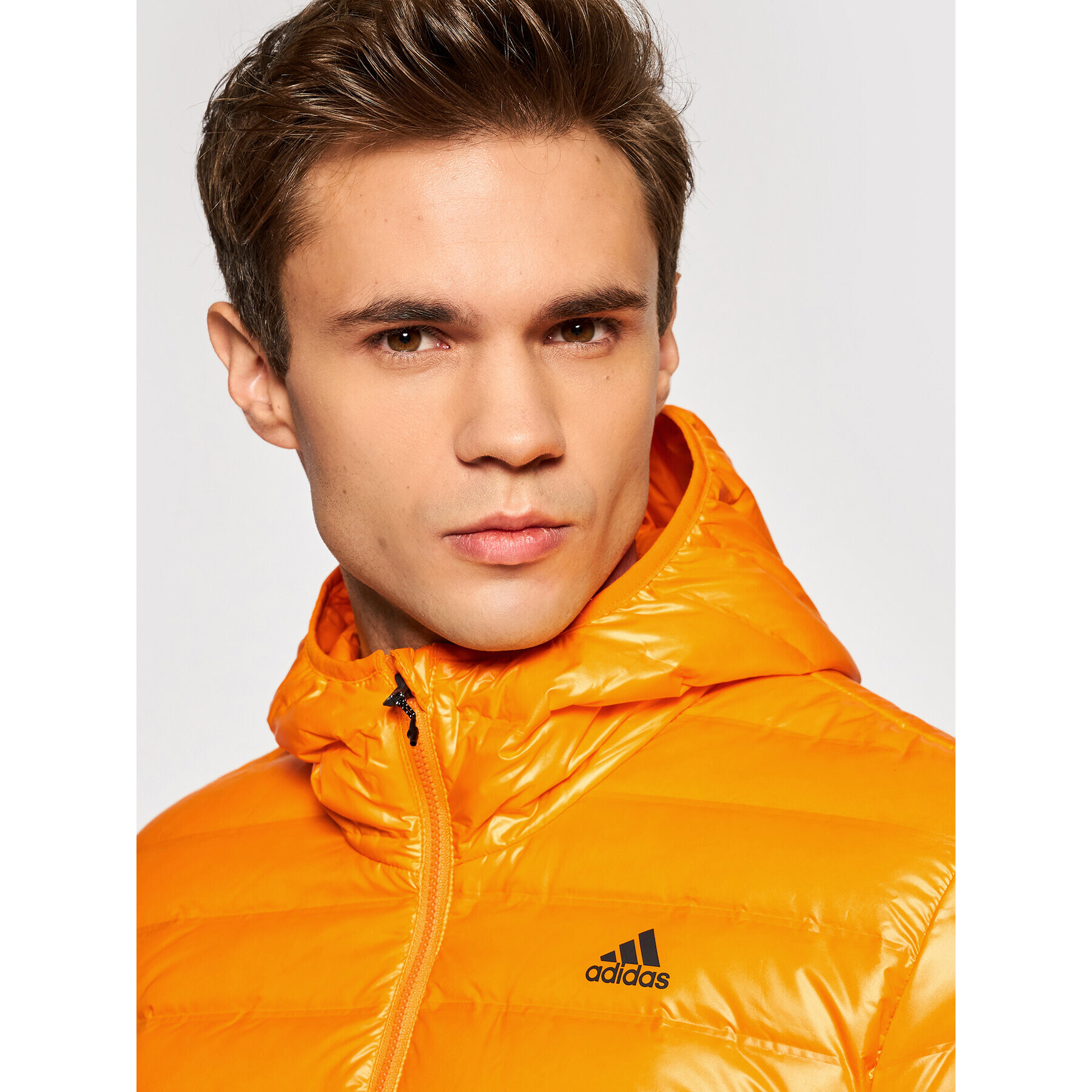 adidas Vatovaná bunda Varilite Hooded GT9215 Oranžová Slim Fit - Pepit.sk