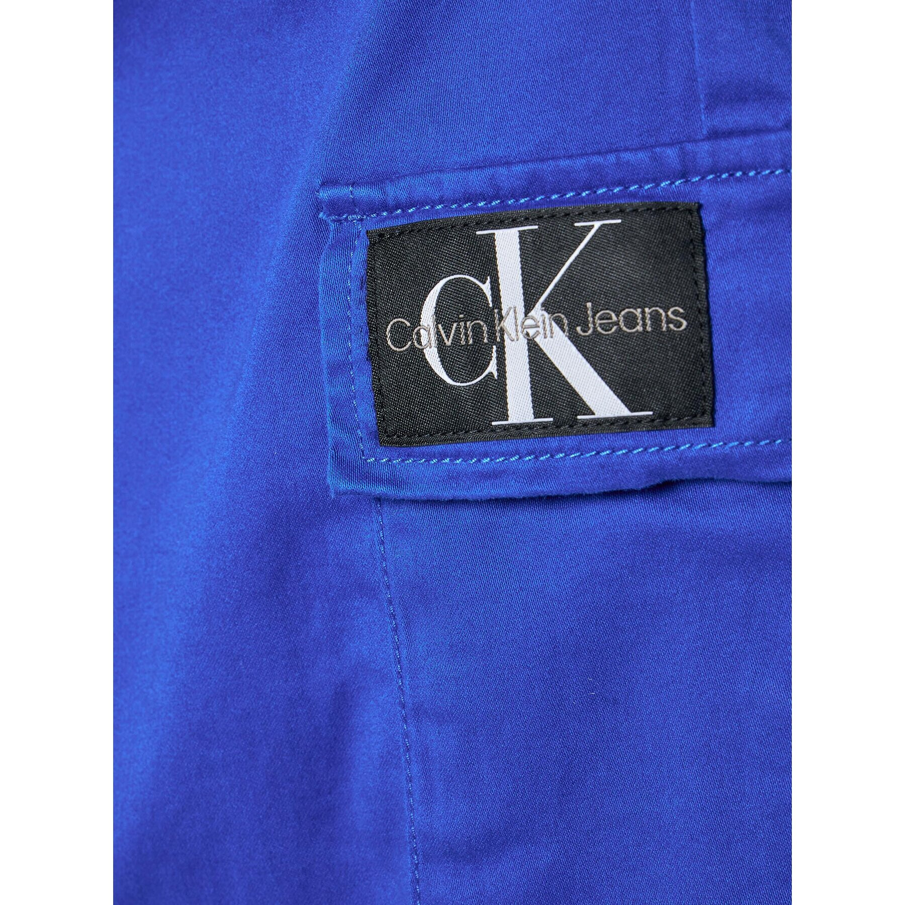 Calvin Klein Jeans Bavlnené nohavice Cargo IB0IB01341 Modrá Regular Fit - Pepit.sk