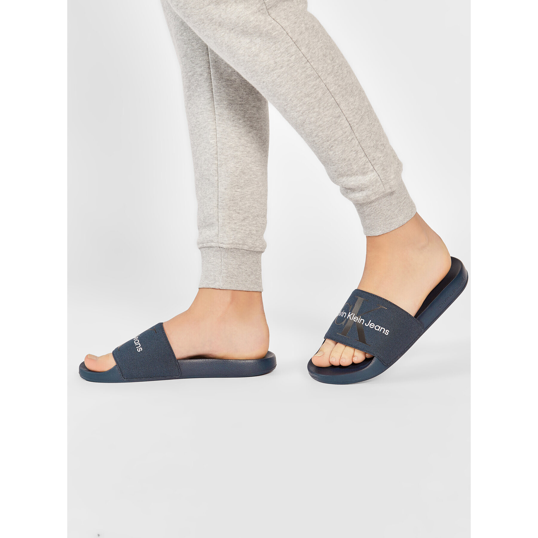 Calvin Klein Jeans Šľapky SLide Monogram Co YM0YM00061 Tmavomodrá - Pepit.sk