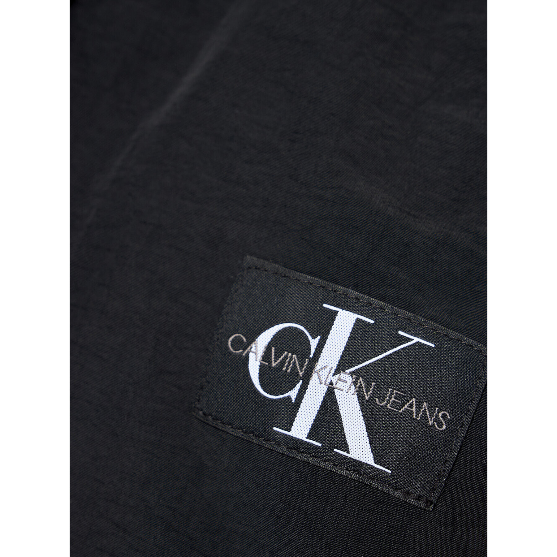 Calvin Klein Jeans Športové kraťasy Punto Fabric Mix Jogger IB0IB00794 Čierna Regular Fit - Pepit.sk