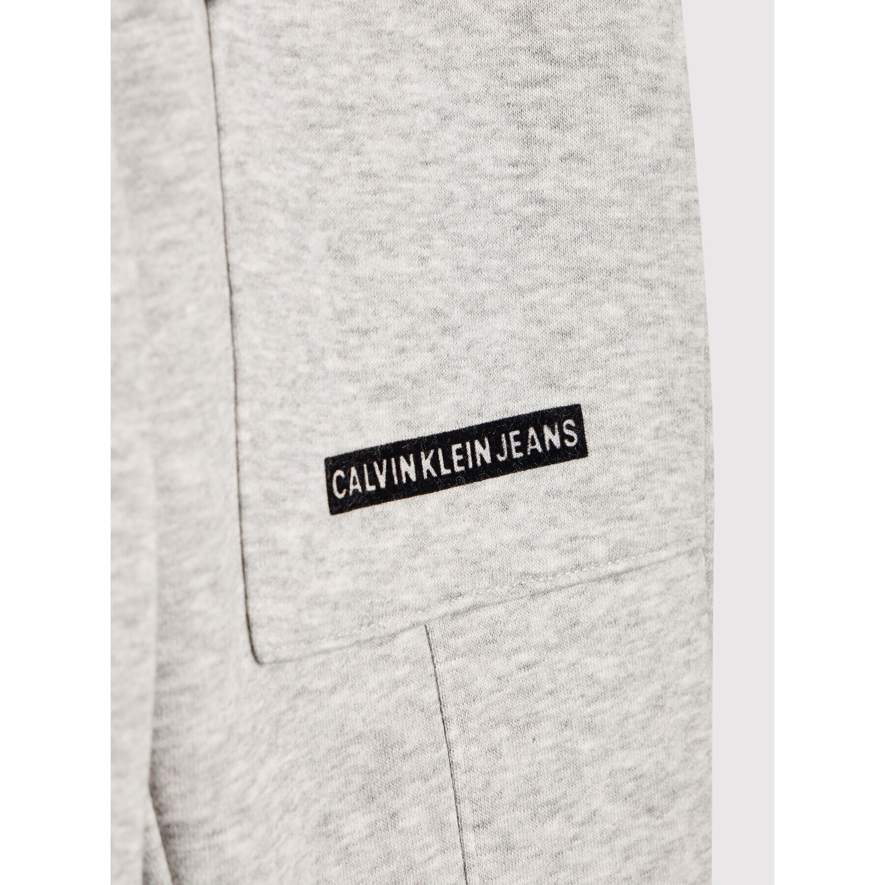 Calvin Klein Jeans Teplákové nohavice Micro Logo IB0IB01012 Sivá Regular Fit - Pepit.sk