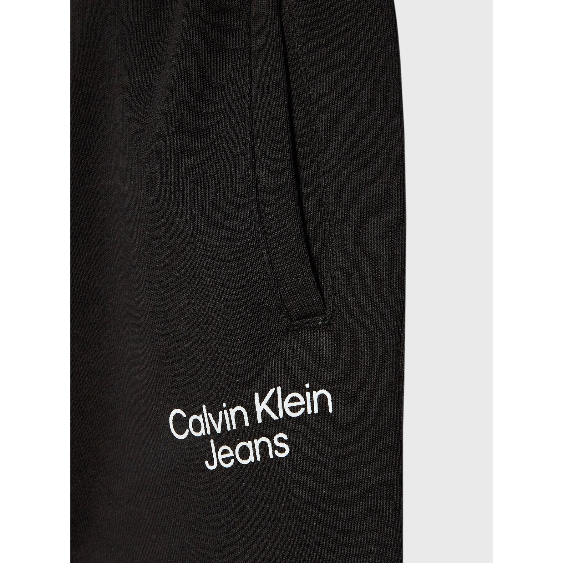 Calvin Klein Jeans Teplákové nohavice Stack Logo IB0IB01282 Čierna Regular Fit - Pepit.sk