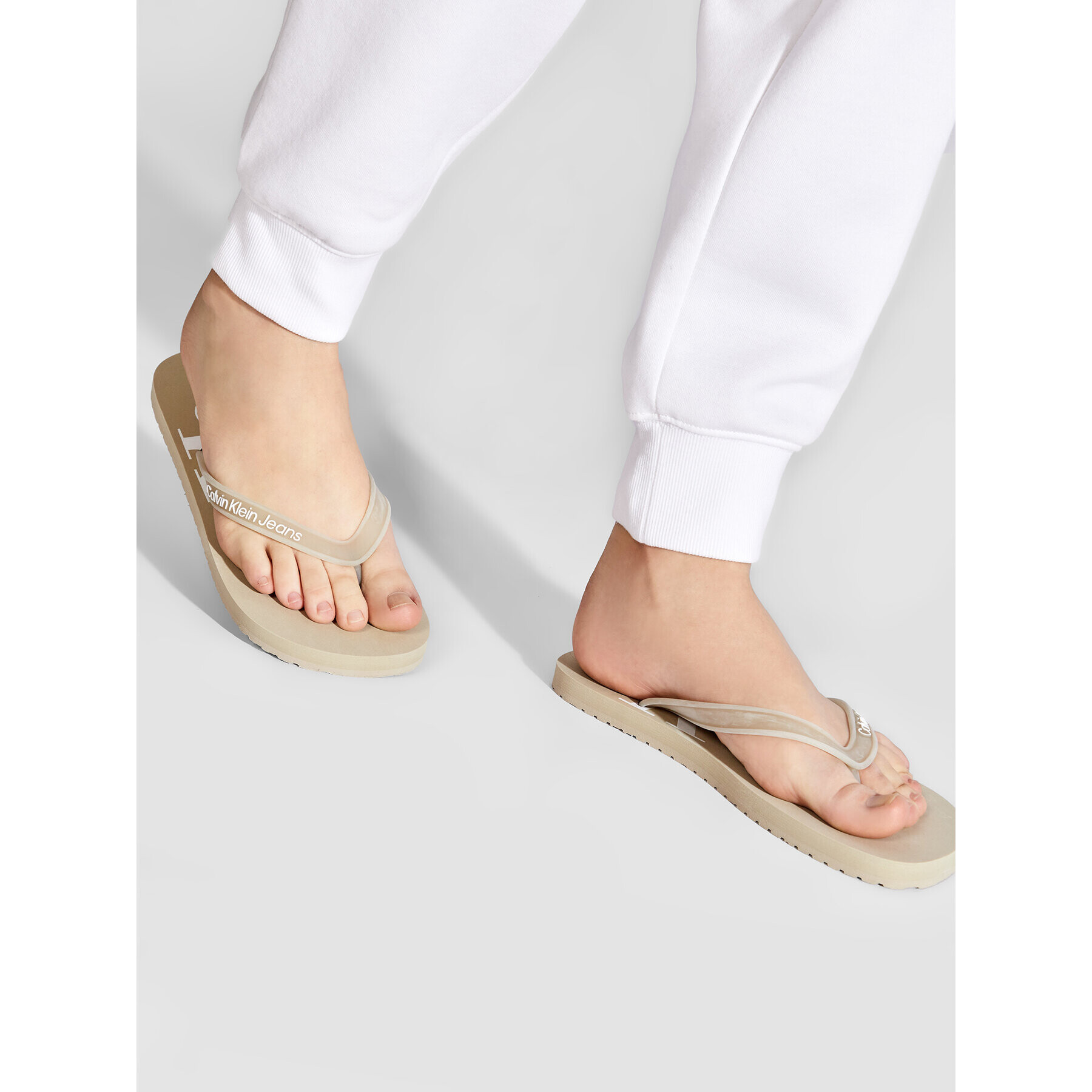 Calvin Klein Jeans Žabky Beach Sandal Monogram Tpu YM0YM00055 Béžová - Pepit.sk