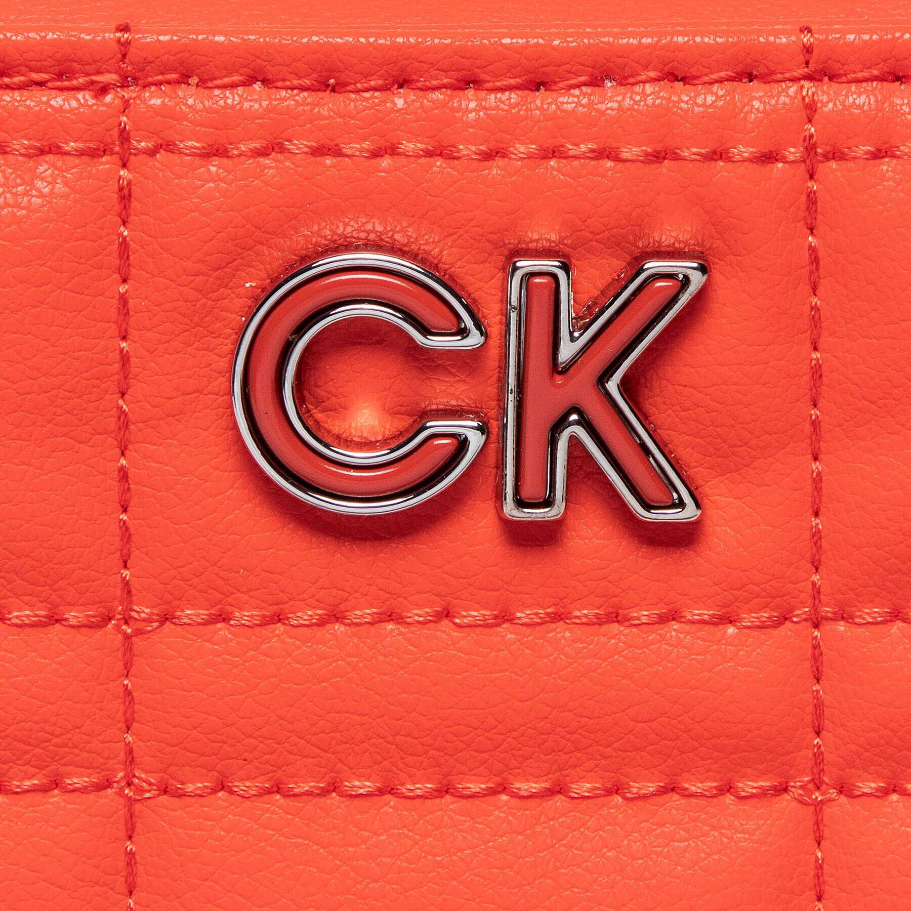 Calvin Klein Puzdro na telefón Re-Lock Quilt Phone Pouch K60K609911 Koralová - Pepit.sk