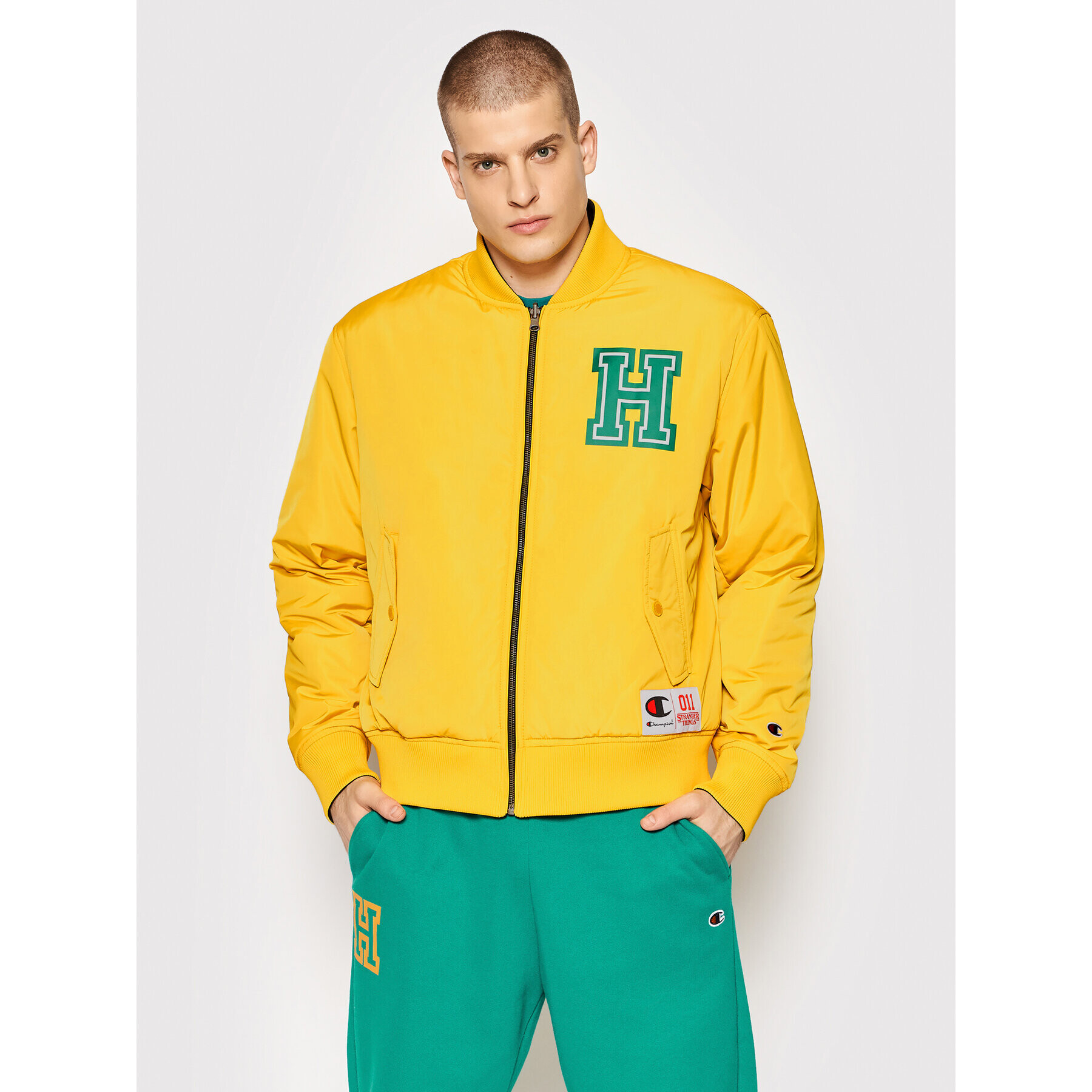 Champion Bomber bunda Unisex STRANGER THINGS Hawkins 217754 Žltá Regular Fit - Pepit.sk