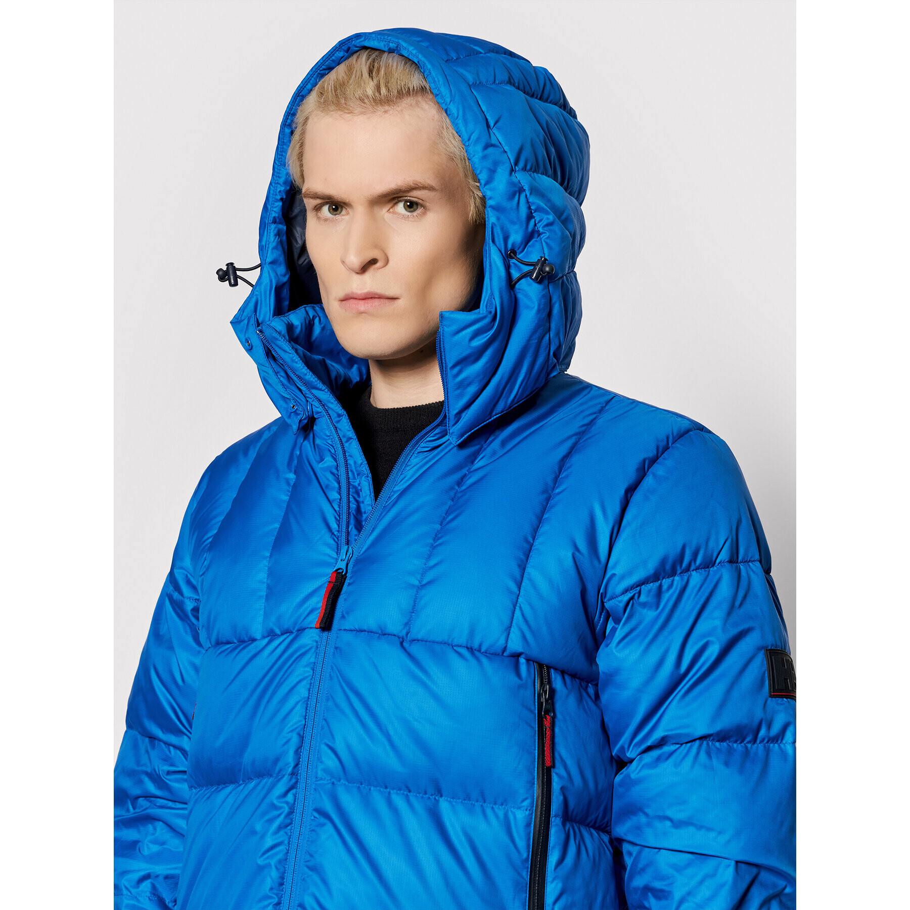 Helly Hansen Vatovaná bunda Veste Duvet 53641 Modrá Regular Fit - Pepit.sk