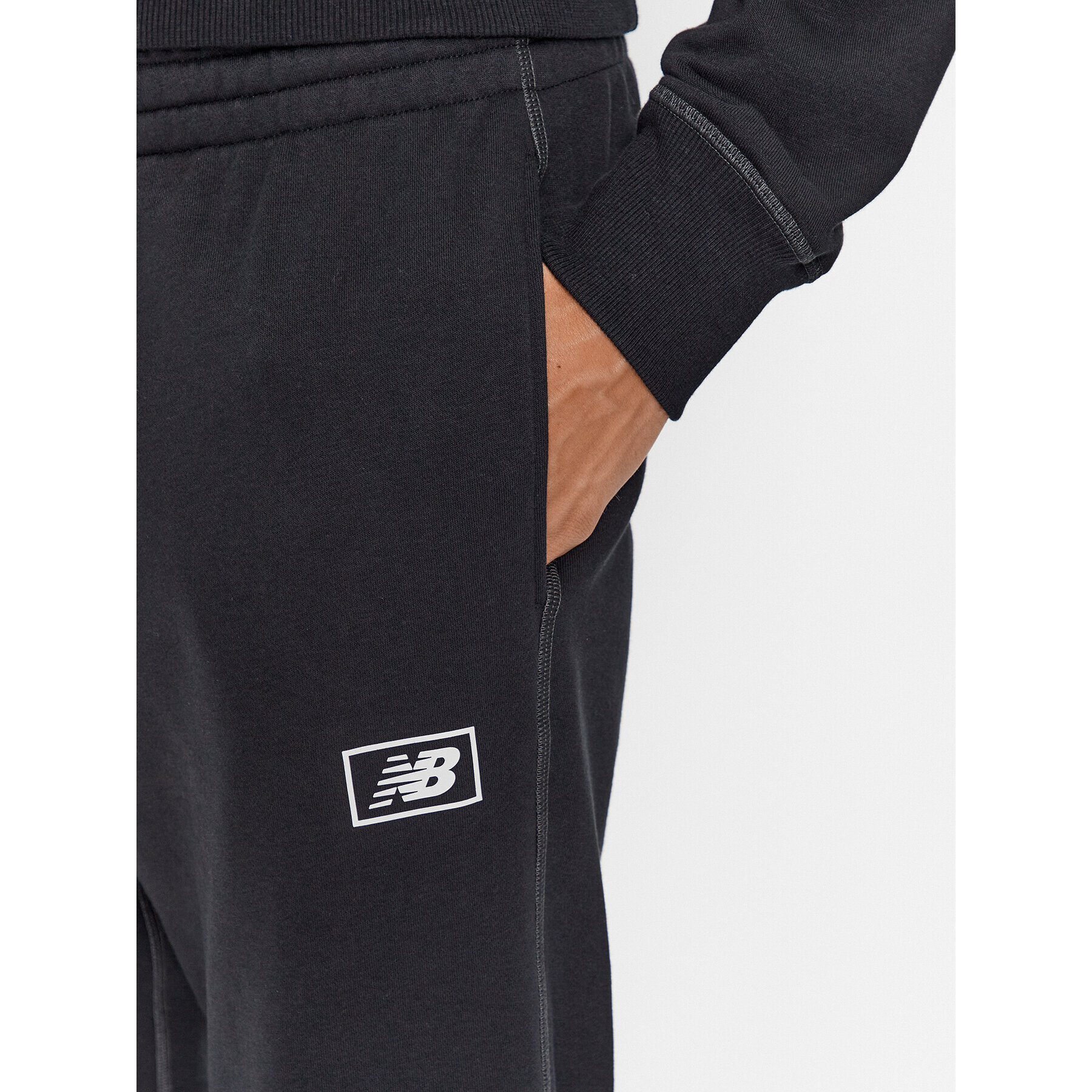 New Balance Teplákové nohavice NB Essentials Sweatpant MP33509 Čierna Regular Fit - Pepit.sk