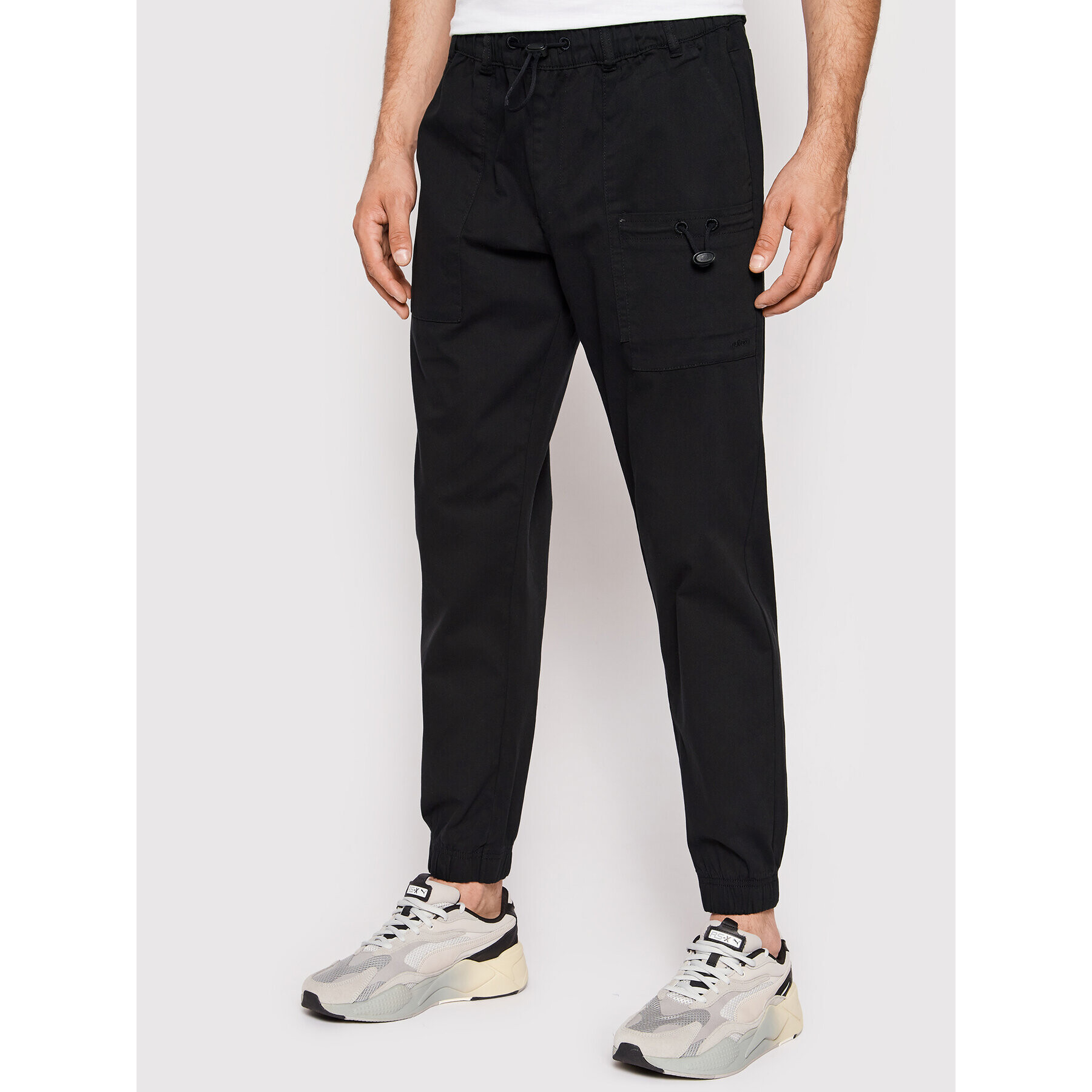 Outhorn Jogger nohavice SPMC601 Čierna Relaxed Fit - Pepit.sk