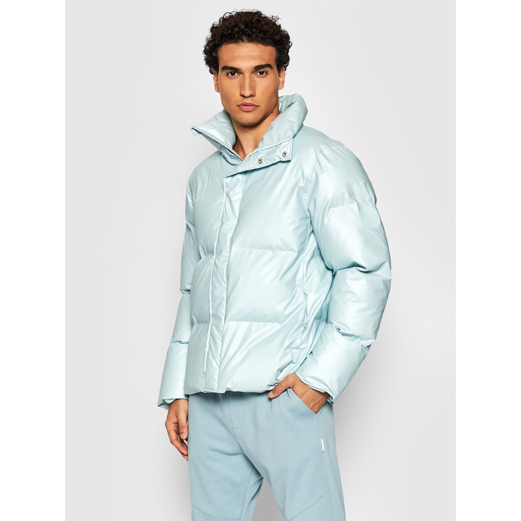 Rains Vatovaná bunda Unisex 1522 Modrá Boxy Fit - Pepit.sk